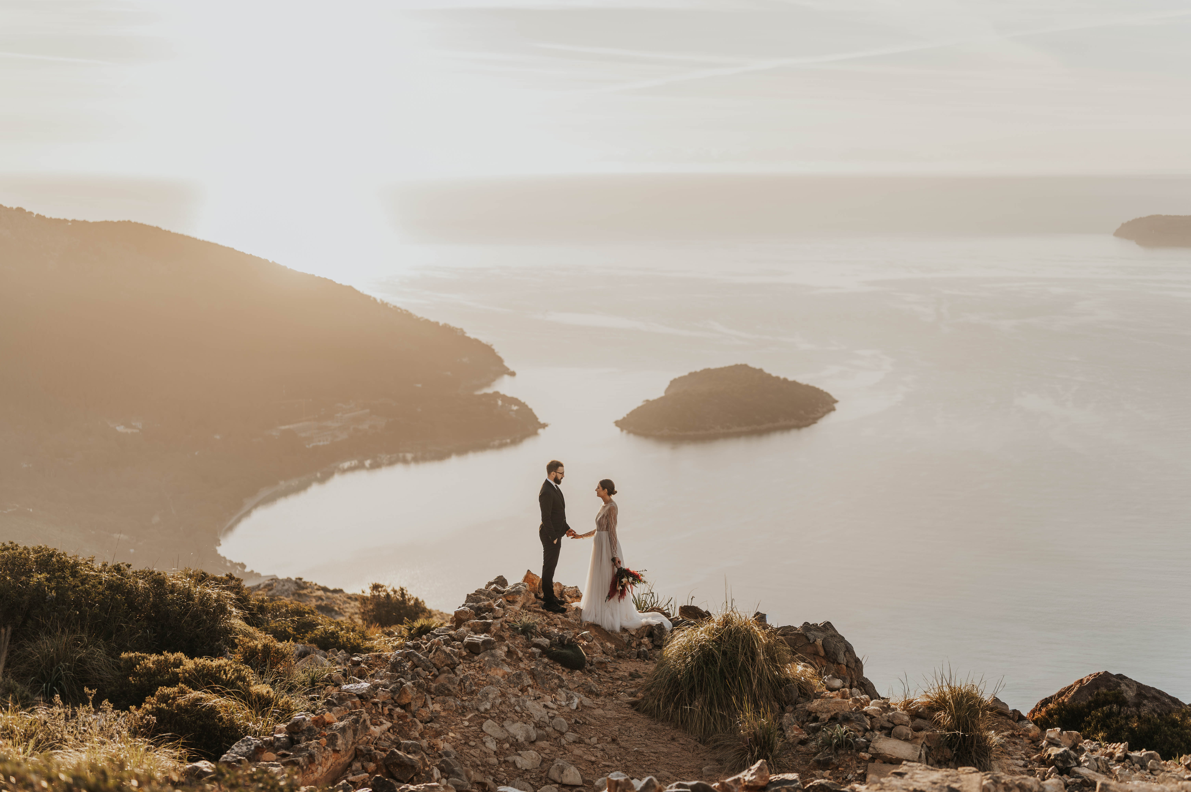 Couple walking through mountain landscape